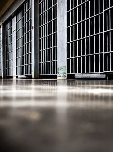 Corridor of cells inside a correctional facility